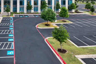 Fresh parking lot markings applied to a commercial parking lot