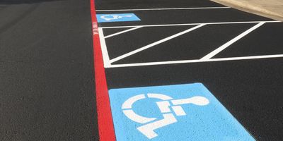 ADA handicapped parking pavement markings on asphalt
