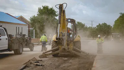 Crew in the demo phase of a asphalt patch project