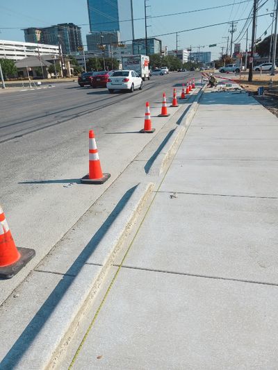 A new concrete sidewalk constructed in Austin, TX