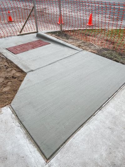 A repair of a sidewalk ramp in Austin, TX