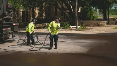 Sealcoating is used to increase the life of asphalt surfaces